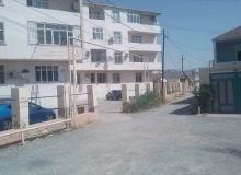 Masazır qəsəbəsi, Bələdiyyənin arxasında